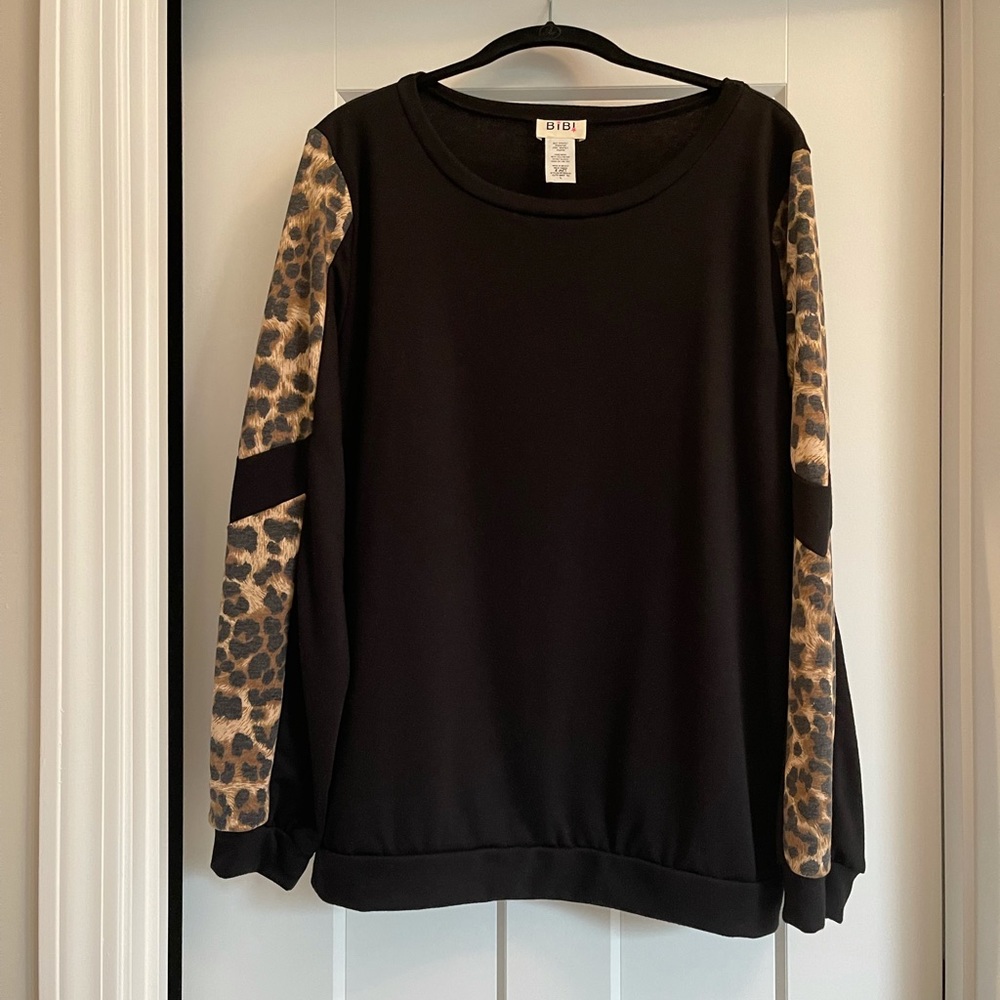New without tags. Bibi black top. Size Large.